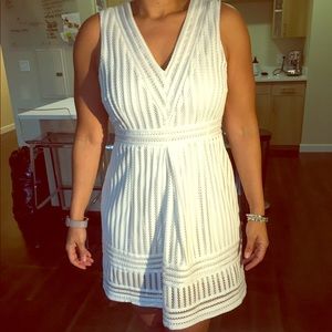 SOLD! Sleeveless, fit and flare V-Neck White Dress